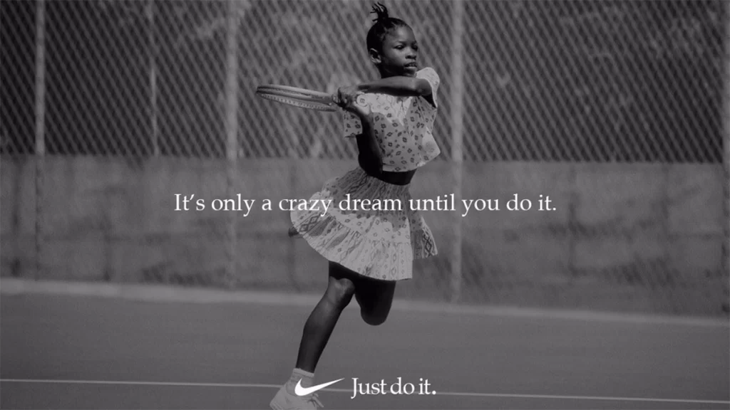 A Nike graphic featuring a young tennis player with a text overlay "It's only a crazy dream until you do it."