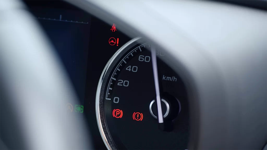 The speedometer of a car indicating a speed of 75 kilometres per hour.