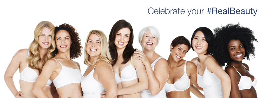 8 women of mixed ethnicities wearing white bras, as part of a Dove brand promotion.