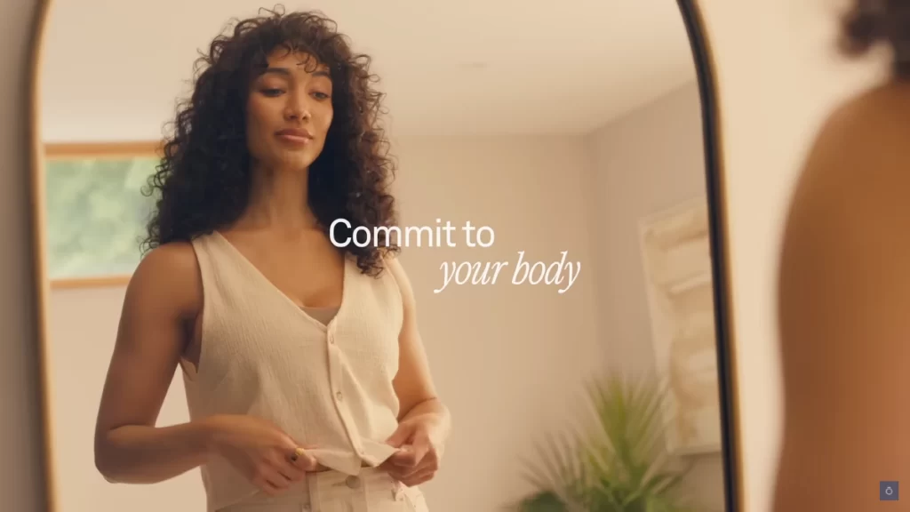 A call to action seen in a brand film by Oura. It states "Commit To Your Body".