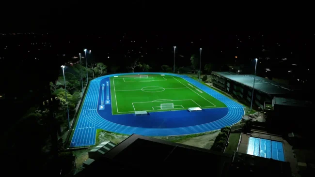 Night drone videography by Fixon Media Group of Peninsula Grammar athletics track.